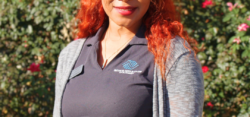 Portrait of smiling woman with red hair