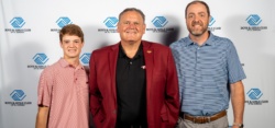 Three people at Boys and Girls Club backdrop